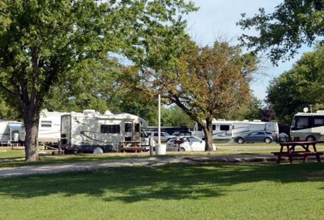 The large pines and massive oak trees of Yukon Trails Camping & RV Resort near Wisconsin Dells surrounds each spacious site. Enjoy rustic family camping, in true Wisconsin fashion, combined with our modern facilities and amenities.